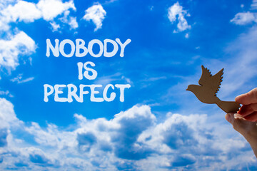 Nobody is perfect symbol. Concept words Nobody is perfect. Beautiful blue sky clouds background....