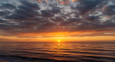 Fototapeta premium 燃える夕日 海面輝く穏やか景色