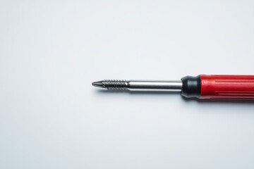 Fototapeta premium A screwdriver on plain surface isolated on white background