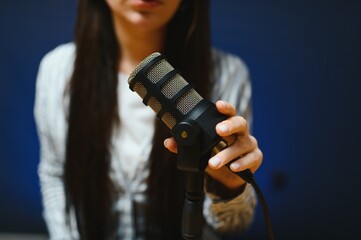 Female vlogger influencer speaking looking at camera, young woman blogger greets fans and talks...