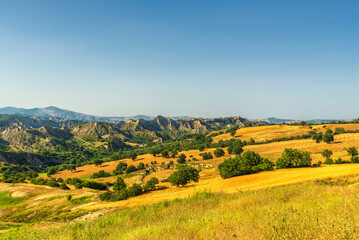 Fototapeta premium rural countryside landscape during a sunny summer day inside Val d'Agri, Basilicata