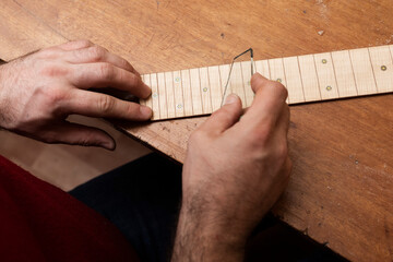 The craftsman broke off a piece of glass