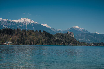 Bled, Slovenia - Aerial panoramic view of beautiful Bled Castle Blejski Grad with Lake Bled Blejsko Jezero , the Church of the Assumption of Maria and Julian Alps at background on a nice summer day