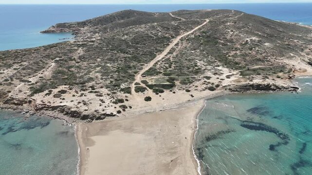 Prasonisi, where Aegean Sea meets the Mediterranean Sea. Incredible sandy beach of Prasonisi, in Rhodes Island of Greece. Prasonisi is a natural wavebreaker.