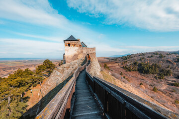 Watchtower of Boldogkő or Boldogko fortress with Boldogkővárallja village near tokaj region in...