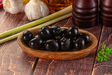 Mediterranean marinated Black olives in the bowl