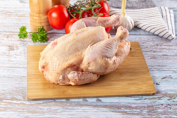 Raw whole uncooked organic chicken
