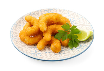 Many tasty tempura shrimps with lime and parsley isolated on white
