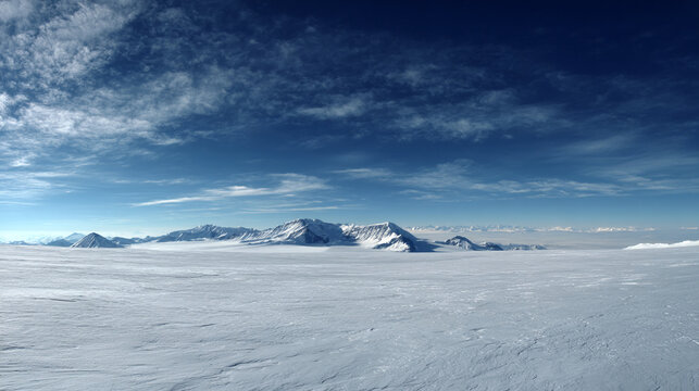 Vast, snow-covered plain stretches to snow-capped mountains under a bright blue sky with scattered clouds, conveying serenity and vastness of the Antarctic landscape - Powered by Adobe