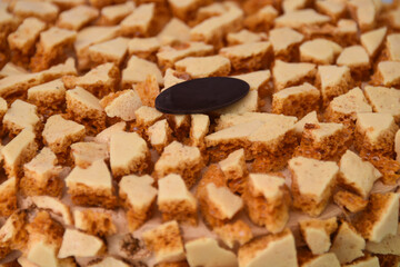 Coffee Crunch Cake Garnished with Toffee Pieces perfect for food photography and culinary dessert closeup side view