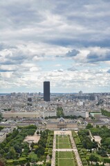 The Champ de Mars is a public garden in Paris located on the Left Bank. It is bordered to the northwest by the Eiffel Tower and to the southeast by the École Militaire.
