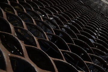 Macro photography, metal mesh with dark background