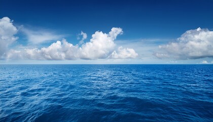 Obraz premium blue sea and sky with clouds