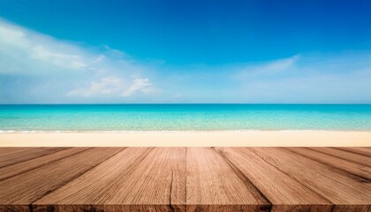Fototapeta premium Empty wood table top and blurred summer beach with blue sea and sky banner background - can used for display or montage your products