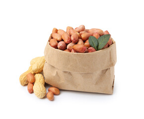 Fresh peanuts in paper bag and unpeeled ones isolated on white