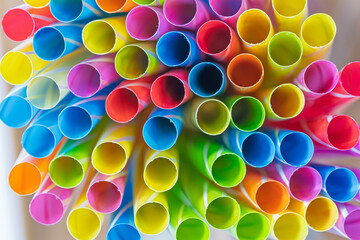 A Bunch of colourful plastic straws as a background