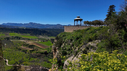 Fototapeta premium Panoramic view of Ronda in Andalusia, Spain, featuring a gazebo overlooking El Tajo gorge