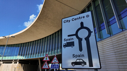 Road sign indicating Spain and city centre in Gibraltar, UK