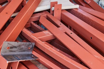 Steel beam sections and brackets for building construction