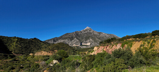 La Concha mountain dominating Marbella landscape under clear blue sky