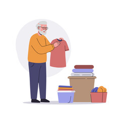 elderly man donating clothes folding laundry at home in a bright atmosphere  