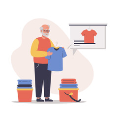 elderly man donating clothes choosing shirt while doing laundry at home  