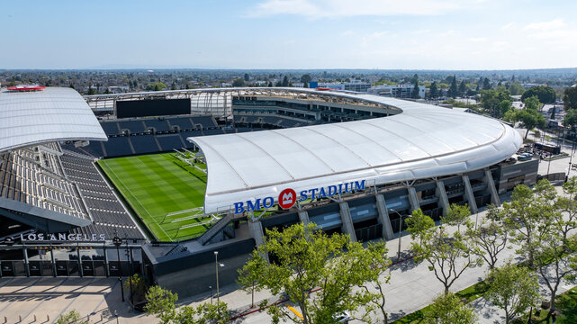 aerial shot of BMO Stadium soccer field home of the Los Angeles Football Club with lush green trees Los Angeles California USA