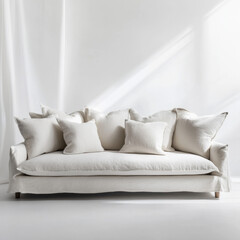 Cozy Linen Sofa: A modern, cream-colored linen sofa adorned with plush pillows, offering a haven of comfort and sophistication, evoking a sense of serenity and minimalist charm.