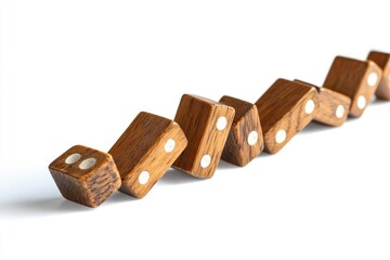 Wooden dominoes cascade, close-up on white