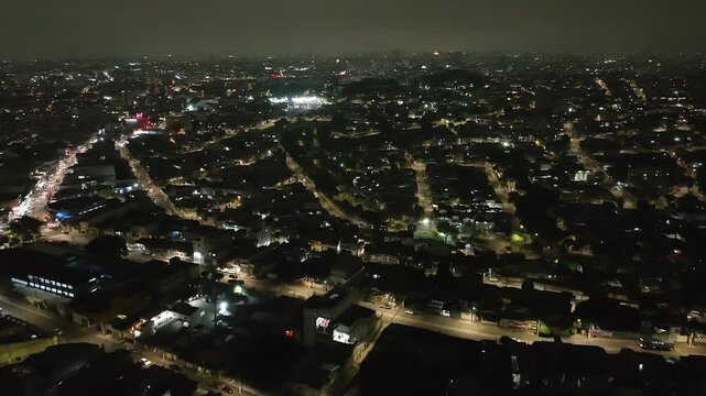 Itaquera neighborhood in S&atilde;o Paulo at night. Aerial view.