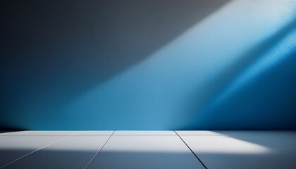 Empty gray and blue background for product presentation with light and shadow on the wall and floor