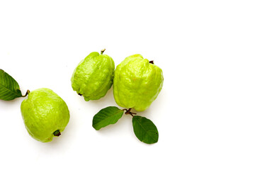 Fresh guava fruit with leaves on white background