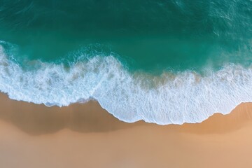 Ocean waves meet sand