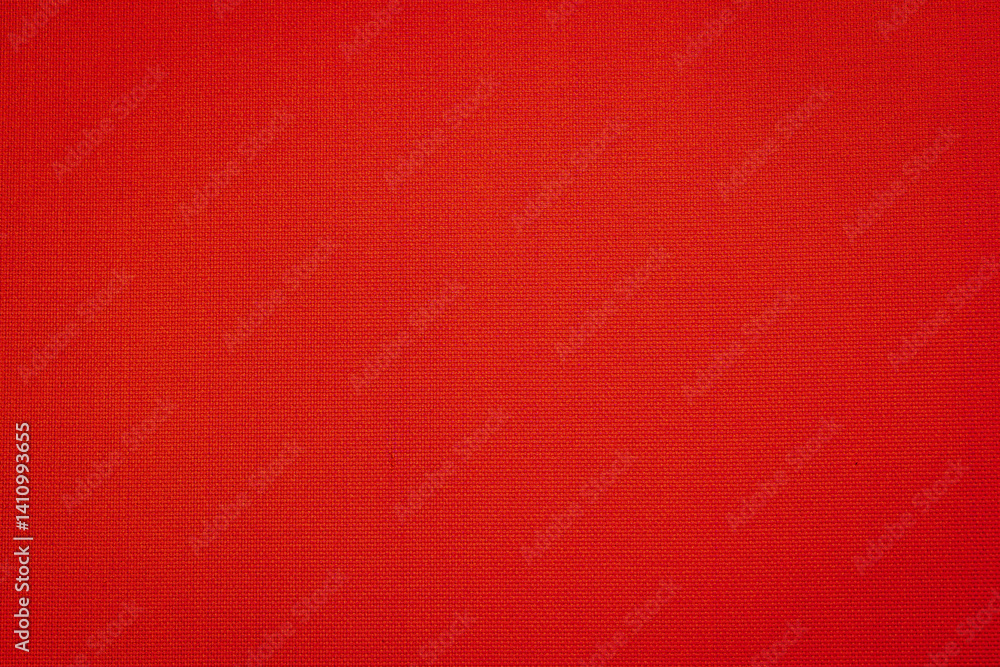 Aufkleber a vibrant red fabric laid out flat highlights its textured surface, creating a perfect backdrop for 