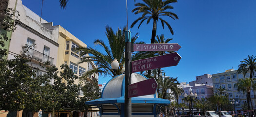 Street signs showing directions to several places of interest in Cadiz, Spain