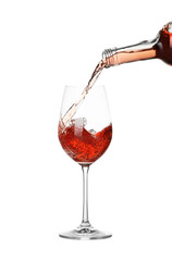 Pouring wine into glass on white background