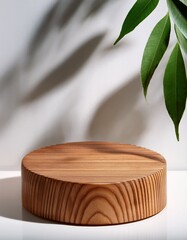 wood podium in white background with green leaves shadow