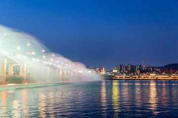 Rainbow fountain show at Banpo Bridge in Seoul, South Korea.