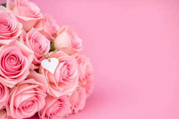bouquet of pink roses with a heart shaped tag2