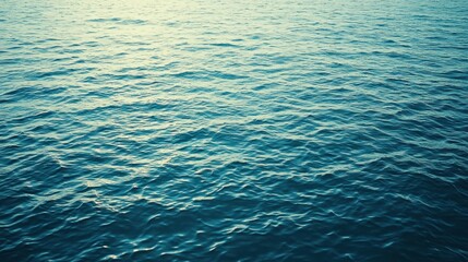 Obraz premium Serene expanse of rippled ocean water.