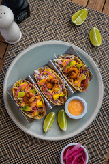 Shrimp Tacos overhead view of plate with three tacos
