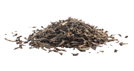 pile of loose leaf black tea on white background