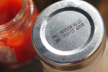 Details of jar lids showing expiration dates and product information