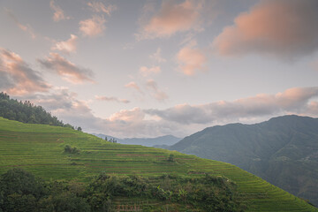 Fototapeta premium Beautiful morning view over tian tou zhai village in longji rice terrace, Guangxi province of China