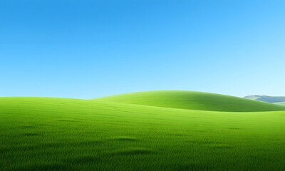 Fototapeta premium A field of green grass with hills in background.