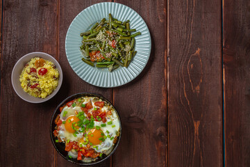 with traditional Jewish dishes for the holiday on the table