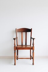 solitary classic wooden library chair stands purposefully against white backdrop with ample copy space for text and
