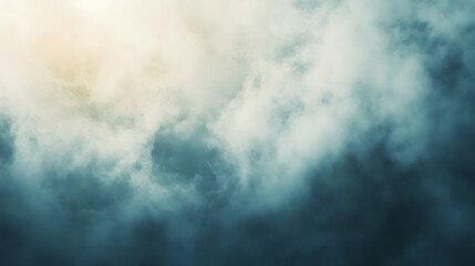 Obraz premium Dense, dramatic clouds obscure a pale light source.