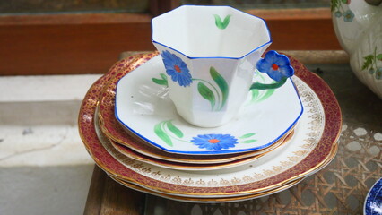 A beautifully patterned ceramic coffee cup in vintage antique style
