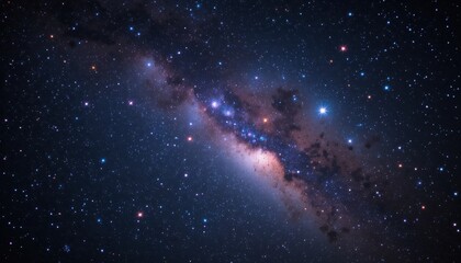 Obraz premium Cosmic River: Celestial Dust and Starlight Across the Night Sky